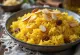 Ghee mishti pulao, сладък ориз, сервиран с печени бадеми и стафиди