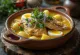 Caldeirada paraense супа с риба, картофи и яйца, сервирана с пресен кориандър